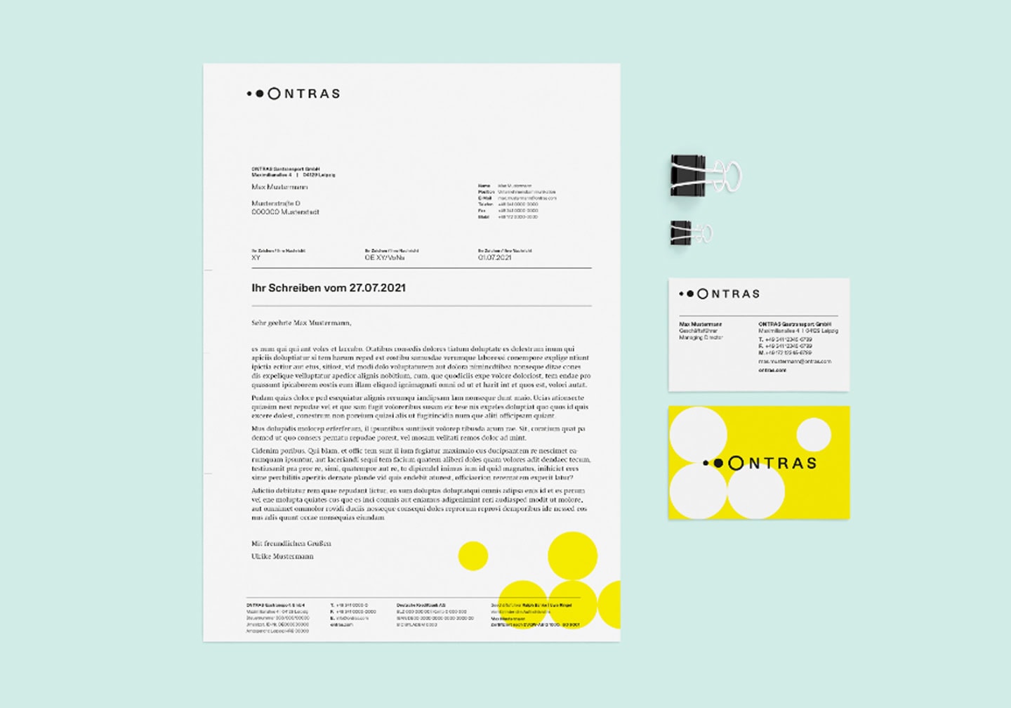 Gestaltungsbeispiele für die Unternehmenskommunikation mit Briefbogen und Visitenkarten im Corporate Design.